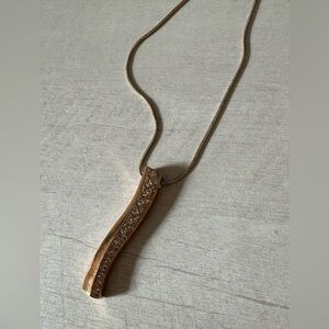 Elegant Gold and Silver Pendant Necklace